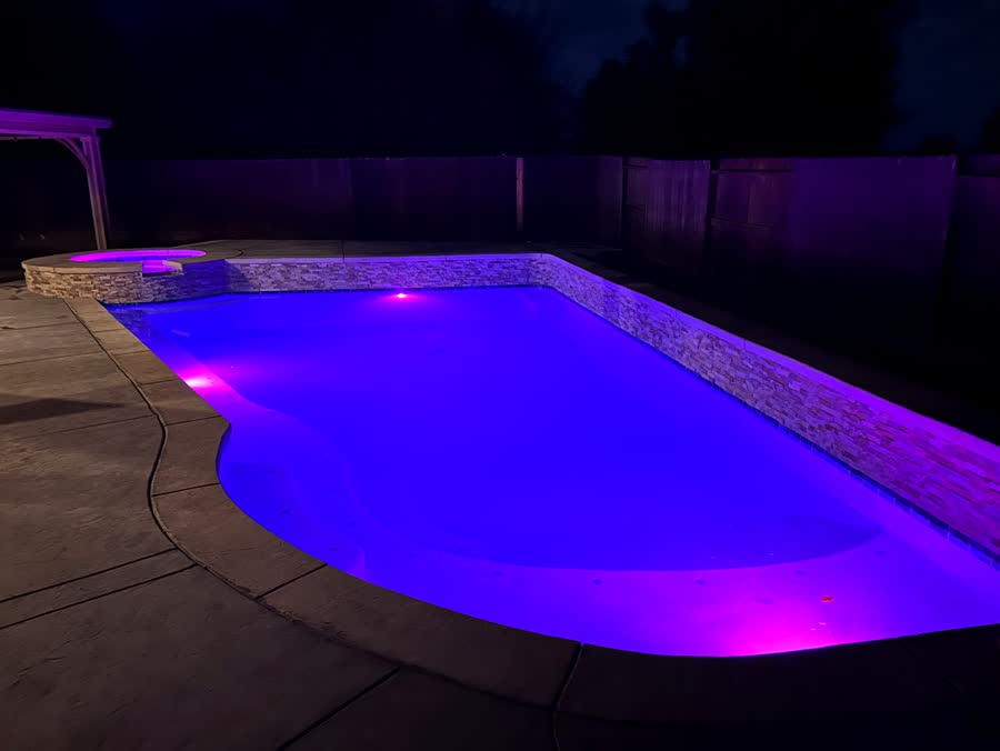 Night — Purple LED — pool built by Neighborhood Pool Service