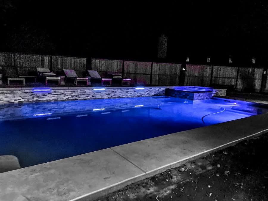Night — Waterfall Wall — pool built by Neighborhood Pool Service