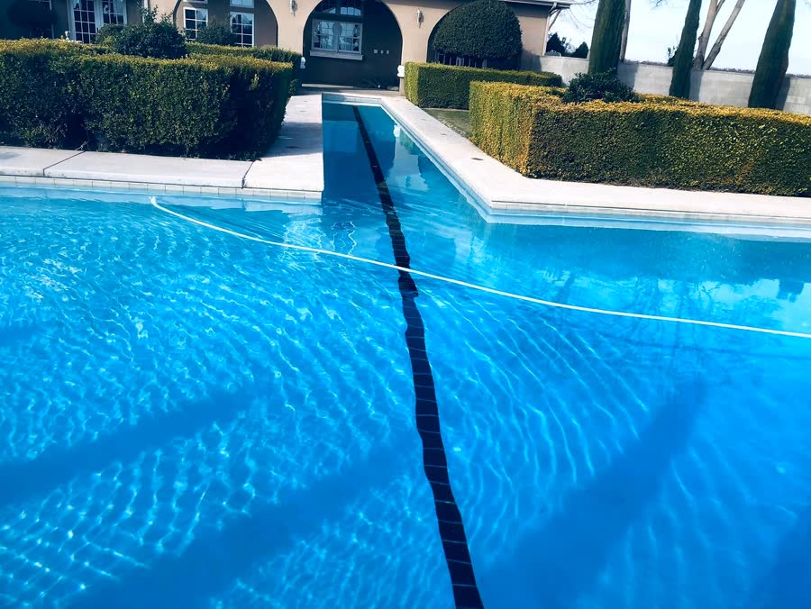 Roman + Round Spa — pool built by Neighborhood Pool Service